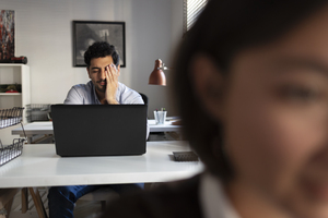 Employee suffering with chronic stress