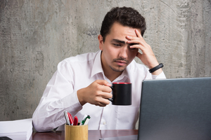 A person being tired because of information overload