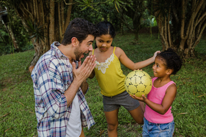 Family spending quality time by engaging in games